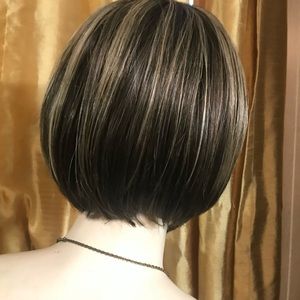 Brown with Blonde highlights wig. Slightly,worn but still in great condition